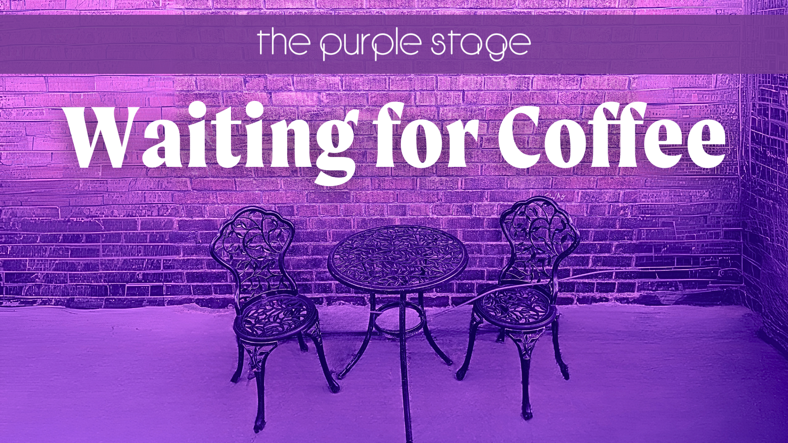 two chairs and a table in front of a brick wall